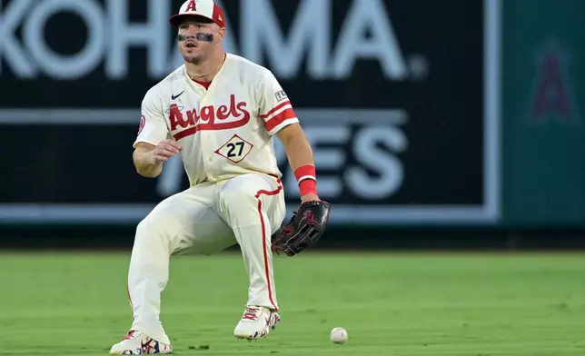 Los Angeles Angels center fielder Mike Trout looks to field a single by Cleveland Guardians' Petey Halpin during the fourth inning of a baseball game Monday, Aug. 24, 2026, in Anaheim, Calif. (AP Photo/Jayne Kamin-Oncea)