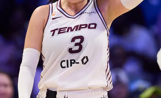 Toronto Tempo guard Marina Mabrey reacts after taking a shot in the first half of a WNBA basketball game against the Dallas Wings in Arlington, Texas, Wednesday, Aug. 12, 2026. (AP Photo/Tony Gutierrez)