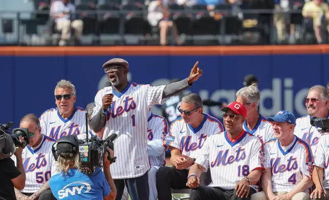 Mookie Wilson (1) speaks during a reunion celebration for the 1986 New York Mets team that won a World Series, Saturday, Aug. 1, 2026, in New York. (AP Photo/Heather Khalifa)