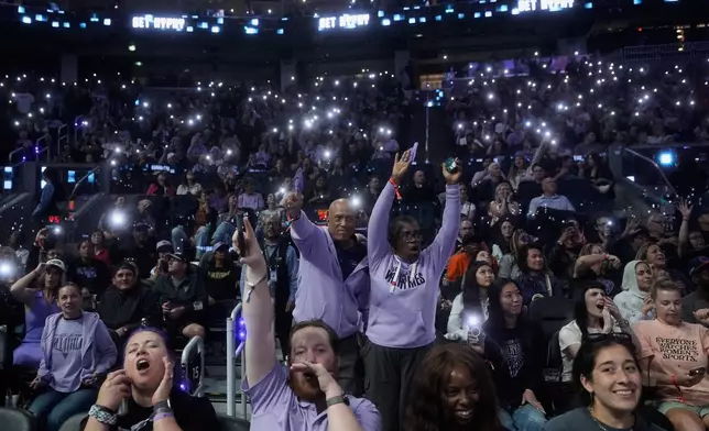 Fans at Chase Center cheer during a time out in the second half of a WNBA basketball game between the Golden State Valkyries and the Dallas Wings in San Francisco, Monday, Aug. 17, 2026. (AP Photo/Jeff Chiu)