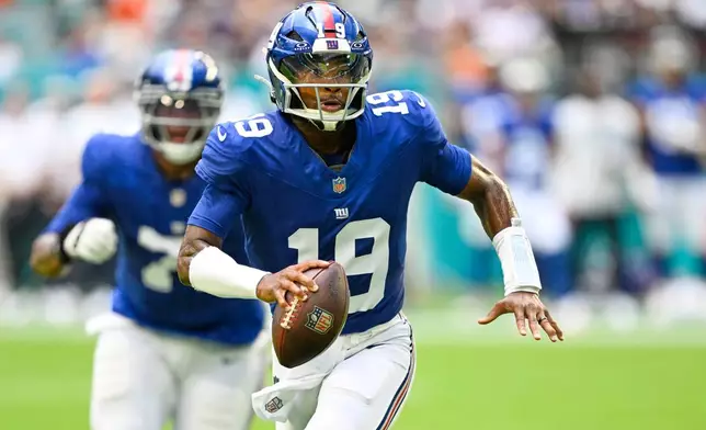 New York Giants quarterback Jameis Winston (19) runs the ball during the first half of a preseason NFL football game against the Miami Dolphins, Saturday, Aug. 22, 2026, in Miami Gardens, Fla. (AP Photo/Doug Murray)