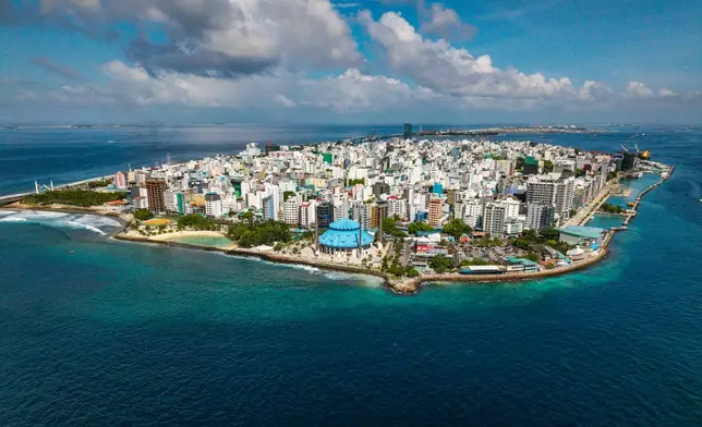 Buildings stand on Male, the capital city of the Maldives, June 19, 2026. (AP Photo/Sophia Nasif)