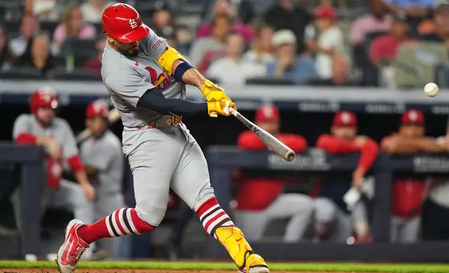 St. Louis Cardinals' Iván Herrera hits a ground-rule double to drive in a run during the fifth inning of a baseball game against the New York Yankees Wednesday, Aug. 5, 2026, in New York. (AP Photo/Frank Franklin II)