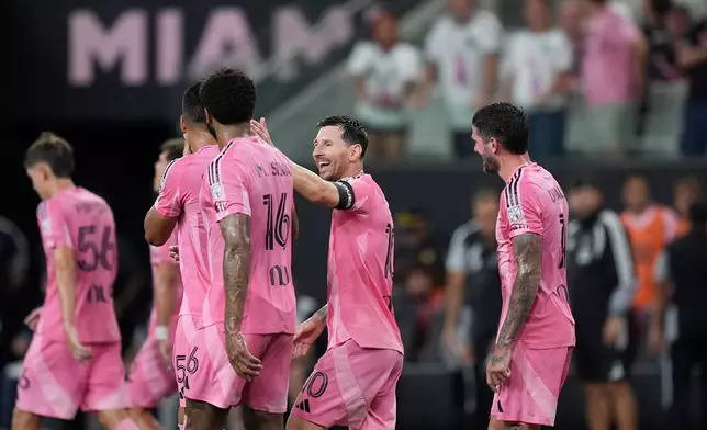 Inter Miami forward Lionel Messi (10) celebrates with teammates after scoring his side's third goal during the first half of a Leagues Cup soccer match against Atletico de San Luis, Wednesday, Aug. 5, 2026, in Miami. (AP Photo/Rebecca Blackwell)