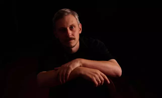 Ukrainian theater Director Ivan Uryvskyi poses for a portrait before the final rehearsal of "Odyssey. Maeotis," which reimagines Homer’s epic, at Ivan Franko theater in Kyiv, Tuesday, Aug. 25, 2026. (AP Photo/Francisco Seco)
