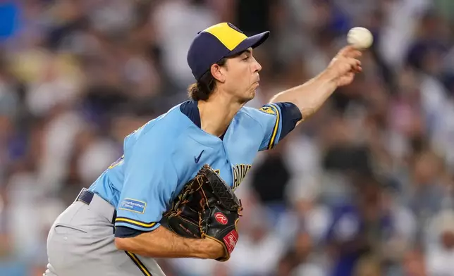 Milwaukee Brewers starting pitcher Robert Gasser throws to the plate during the second inning of a baseball game against the Los Angeles Dodgers, Friday, Aug. 14, 2026, in Los Angeles. (AP Photo/Mark J. Terrill)
