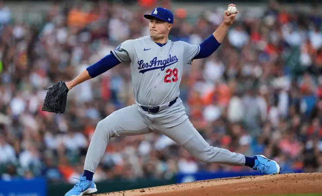 Los Angeles Dodgers pitcher Tarik Skubal throws against the Detroit Tigers during the first inning of a baseball game Friday, Aug. 28, 2026, in Detroit. (AP Photo/Paul Sancya)