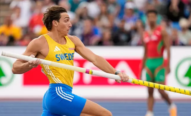 Sweden's Armand Duplantis makes an attempt in the men's pole vault final at the European Athletics Championships in Birmingham, England, Sunday, Aug. 16, 2026. (AP Photo/Matthias Schrader)