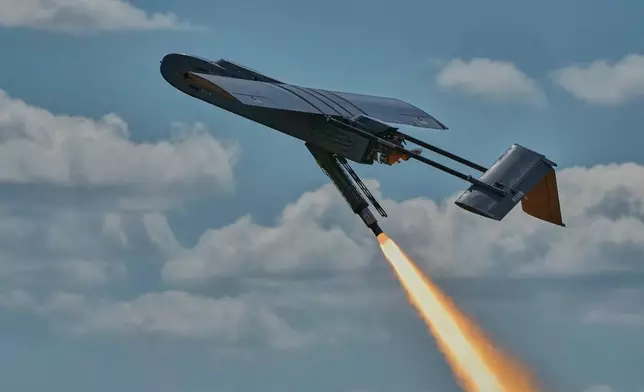 A Ukrainian FP-1 long-range attack drone is launched by the 413th Separate Regiment of Unmanned Systems "Raid" on a deep-strike drone mission to hit Russian targets deep in their territory, in an undisclosed location in Ukraine, Sunday, Aug. 16, 2026. (AP Photo/Efrem Lukatsky)