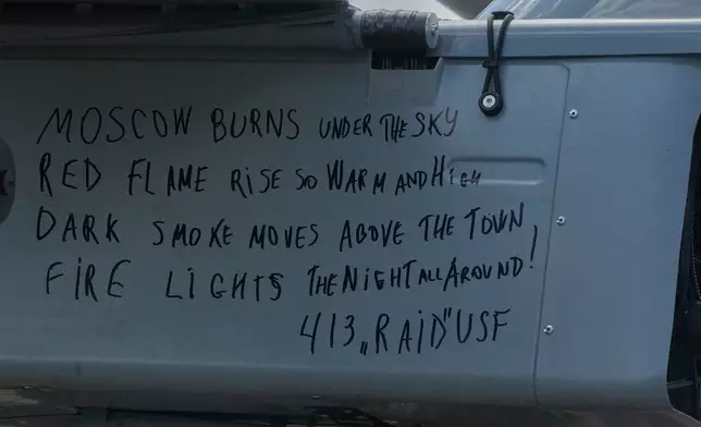 This photo taken Sunday, Aug. 16, 2026, shows a message to Russians written by Yevhen Karas, commander of Ukraine's 413th Separate Regiment of Unmanned Systems "Raid", on an FP-1 long-range attack drone during a deep-strike drone mission to hit Russian targets deep in their territory, in an undisclosed location in Ukraine. (AP Photo/Efrem Lukatsky)