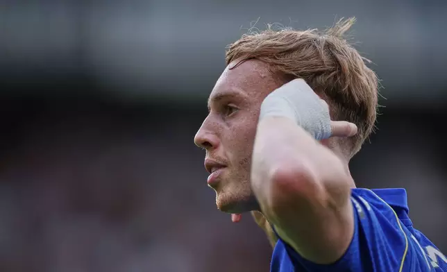 Chelsea's Cole Palmer celebrates after scoring his side's fourth goal during the English Premier League soccer match between Chelsea and Brighton and Hove Albion in London, Sunday, Aug. 30, 2026. (AP Photo/Ian Walton)