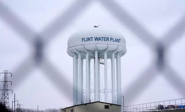 FILE - The Flint water plant tower is seen, Jan. 6, 2022, in Flint, Mich. (AP Photo/Carlos Osorio, File)