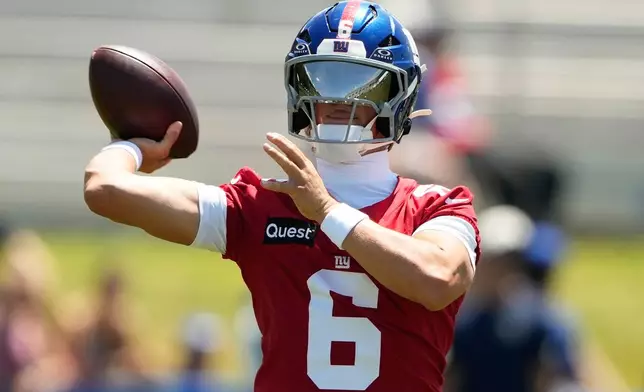 New York Giants quarterback Jaxson Dart practices during an NFL football training camp, Friday, July 31, 2026, in White Sulphur Springs, W.Va. (AP Photo/Chris Carlson)