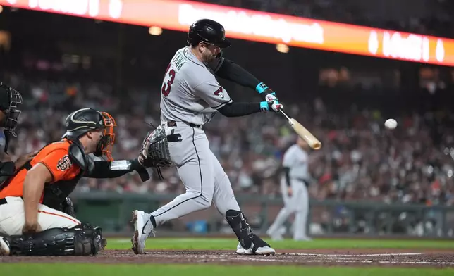 Arizona Diamondbacks' Tim Tawa hits a three-run home run against the San Francisco Giants during the third inning of a baseball game in San Francisco, Friday, Aug. 28, 2026. (AP Photo/Tony Avelar)