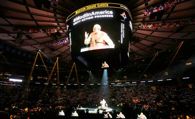 FILE - Prime Minister Narendra Modi of India gives a speech during a reception by the Indian community in honor of his visit to the United States at Madison Square Garden, Sunday, Sept. 28, 2014, in New York. (AP Photo/Jason DeCrow, File)