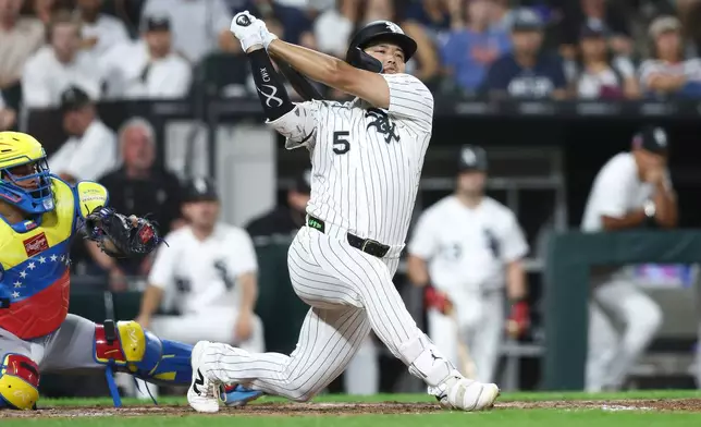 Chicago White Sox's Munetaka Murakami (5) strikes out swinging during the fifth inning of a baseball game against the New York Mets in Chicago, Saturday, Aug. 22, 2026. (AP Photo/Jessie Alcheh)