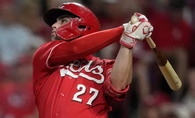 Cincinnati Reds' Sal Stewart watches his three-run homer the sixth inning of a baseball game against the St. Louis Cardinals, Wednesday, Aug. 19, 2026, in Cincinnati. (AP Photo/Carolyn Kaster)