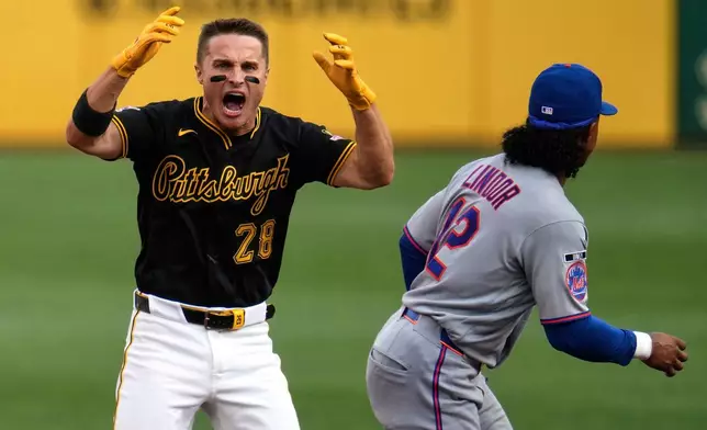 Pittsburgh Pirates' Jake Mangum (28) celebrates on second base after leading off the baseball game with a double off New York Mets pitcher Robert Stock during the first inning in Pittsburgh, Saturday, Aug. 8, 2026. (AP Photo/Gene J. Puskar)