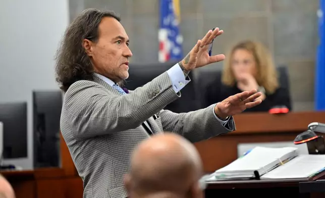 Defense attorney Michael Sanft questions a witness during the Duane Davis murder trial, related to the 1996 killing of rapper Tupac Shakur, at Clark County District Court at the Regional Justice Center in Las Vegas, Wednesday, Aug. 19, 2026. (David Becker/Pool Photo via AP)