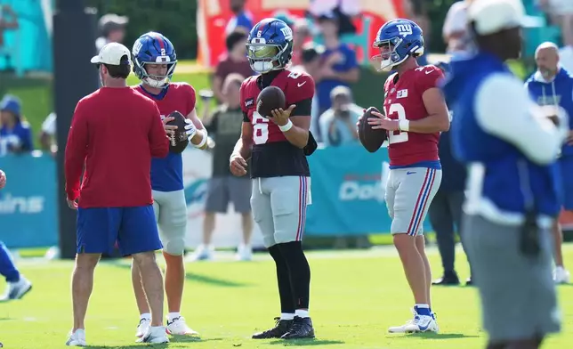 New York Giants quarterback Jaxson Dart (6) does drills during a joint NFL football practice with the Miami Dolphins,Thursday, Aug. 20, 2026, in Miami Gardens, Fla. (AP Photo/Lynne Sladky)