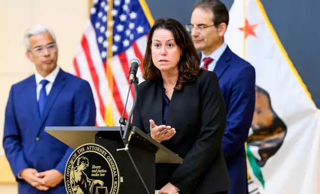 Colorado Attorney General Philip Weiser, right, and California Attorney General Rob Bonta, left, join New Jersey Attorney General Jennifer Davenport as she discusses a lawsuit against Meta during a press conference on Tuesday, Aug. 18, 2026, in Oakland, Calif. (AP Photo/Noah Berger)
