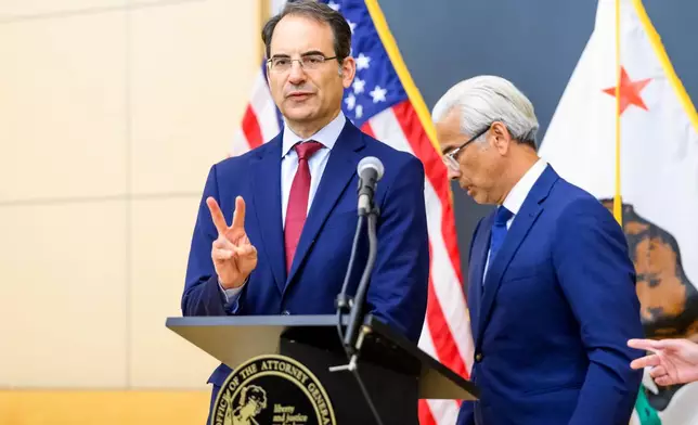 Colorado Attorney General Philip Weiser discusses a lawsuit against Meta during a press conference on Tuesday, Aug. 18, 2026, in Oakland, Calif. (AP Photo/Noah Berger)