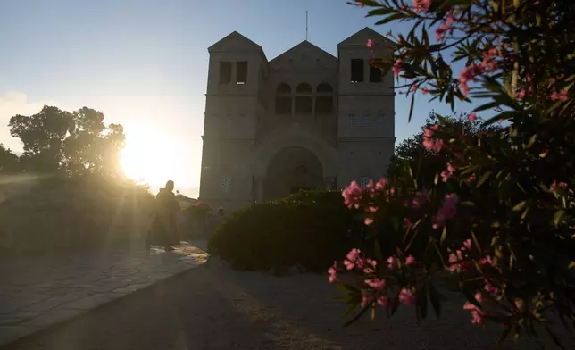 A priest enters the Basilica of the Transfiguration on Mount Tabor, northern Israel, on Aug. 6, 2026. (AP Photo/Ariel Schalit)