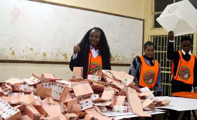 Election workers count ballots at a polling station in Lusaka, South Africa, Thursday, Aug. 13, 2026. (AP Photo/Alfonso Nqunjana)