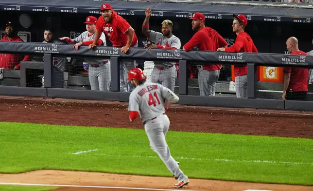 St. Louis Cardinals players celebrates as Alec Burleson (41) runs the bases after hitting a two-run home run during the fourth inning of a baseball game against the New York Yankees Monday, Aug. 3, 2026, in New York. (AP Photo/Frank Franklin II)