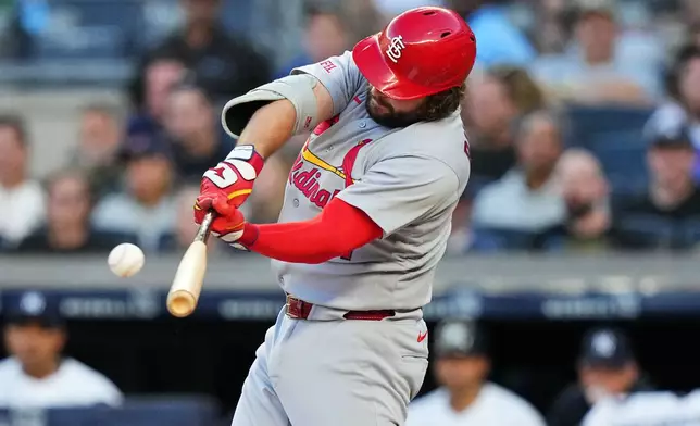 St. Louis Cardinals' Alec Burleson hits a two-run home run during the first inning of a baseball game against the New York Yankees Monday, Aug. 3, 2026, in New York. (AP Photo/Frank Franklin II)