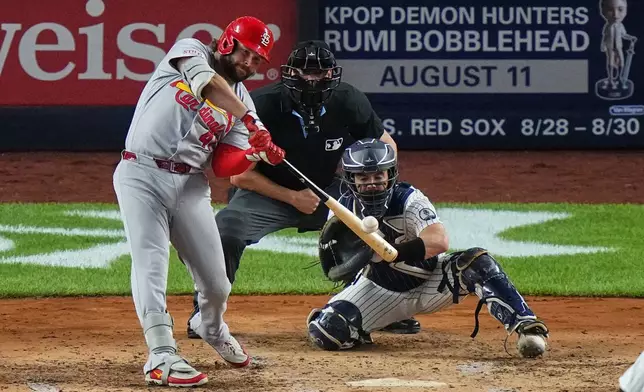 St. Louis Cardinals' Alec Burleson hits a two-run home run during the fourth inning of a baseball game against the New York Yankees Monday, Aug. 3, 2026, in New York. (AP Photo/Frank Franklin II)
