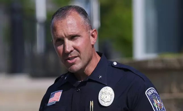Hopkins Police Chief Brent Johnson speaks during a news conference after a stabbing at a daycare, Wednesday, Aug. 12, 2026, in Hopkins, Minn. (AP Photo/Ellen Schmidt)