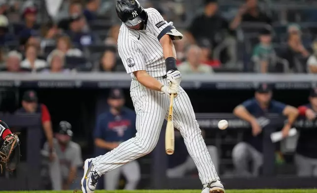 New York Yankees' Paul Goldschmidt hits a home run during the third inning of a baseball game against the Boston Red Sox, Friday, Aug. 28, 2026, in New York. (AP Photo/Yuki Iwamura)