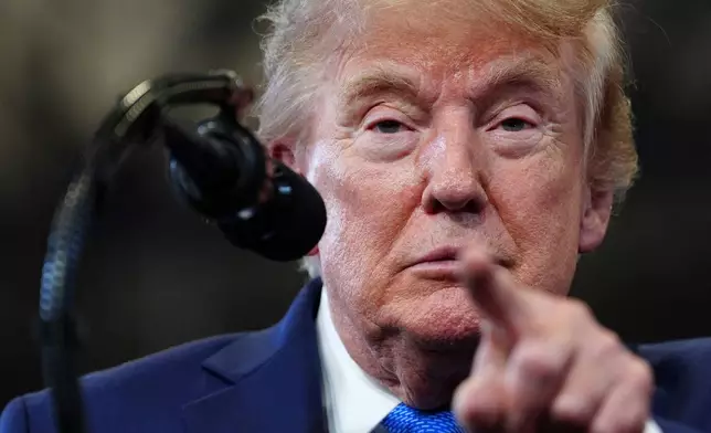 President Donald Trump speaks at the David Mack Center for Training and Intelligence, Friday, Aug. 14, 2026, in Garden City, N.Y. (AP Photo/Julia Demaree Nikhinson)
