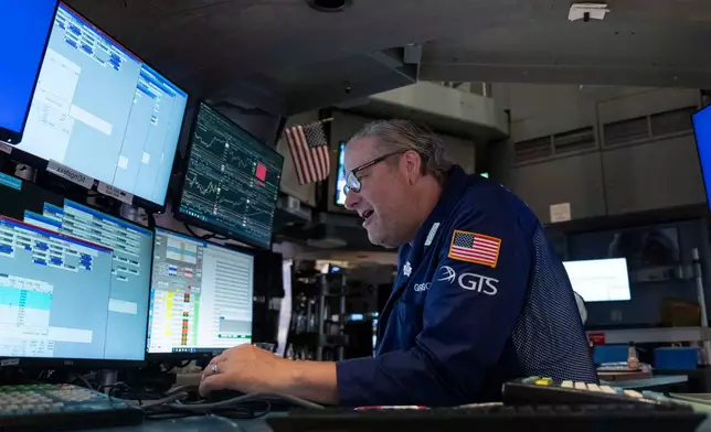Specialist Gregg Maloney works on the floor of the New York Stock Exchange, Monday, Aug. 17, 2026, in New York. (AP Photo/Yuki Iwamura)