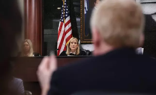 Judge Debra McCaslin listens to testimony as Alex Murdaugh, right, watches during a hearing Friday, Aug. 14, 2026, at the Marc H. Westbrook Judicial Center in Lexington, S.C. (Tracy Glantz/Pool Photo via AP)