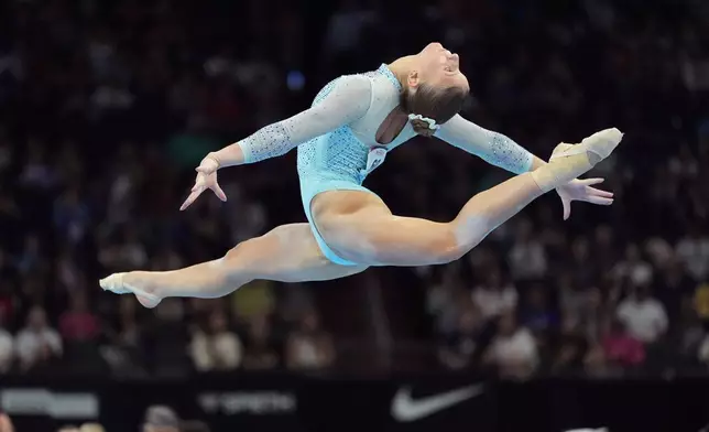 Ally Damelio competes in the women's floor exercise during the U.S. Gymnastics Championships, Sunday, Aug. 9, 2026, in Phoenix. (AP Photo/Ross D. Franklin)