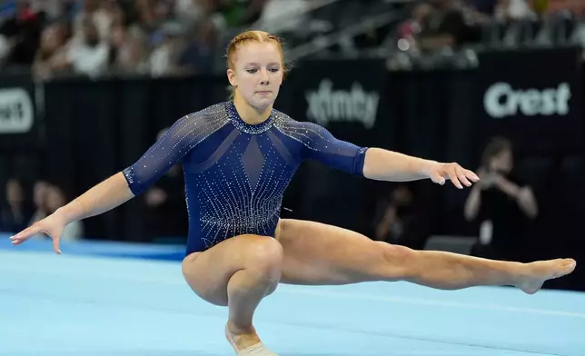 Dulcy Caylor competes in the women's floor exercise during the U.S. Gymnastics Championships, Sunday, Aug. 9, 2026, in Phoenix. (AP Photo/Ross D. Franklin)