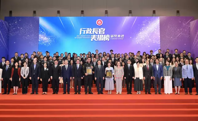 CE presents award certificates of Chief Executive's Award for Exemplary Performance to Inter-departmental Team for Wartime Bomb Disposal with Emergency Relief and Support Services and Inter-departmental Team for Light Public Housing Source: HKSAR Government Press Releases