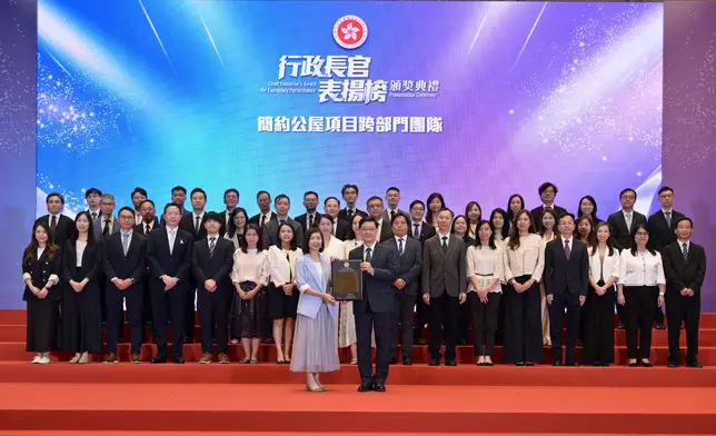 CE presents award certificates of Chief Executive's Award for Exemplary Performance to Inter-departmental Team for Wartime Bomb Disposal with Emergency Relief and Support Services and Inter-departmental Team for Light Public Housing Source: HKSAR Government Press Releases