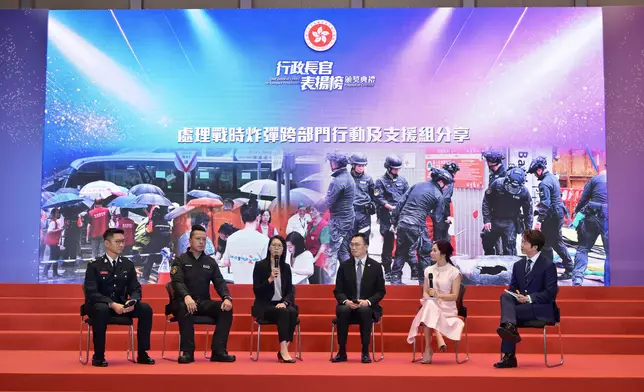 CE presents award certificates of Chief Executive's Award for Exemplary Performance to Inter-departmental Team for Wartime Bomb Disposal with Emergency Relief and Support Services and Inter-departmental Team for Light Public Housing Source: HKSAR Government Press Releases
