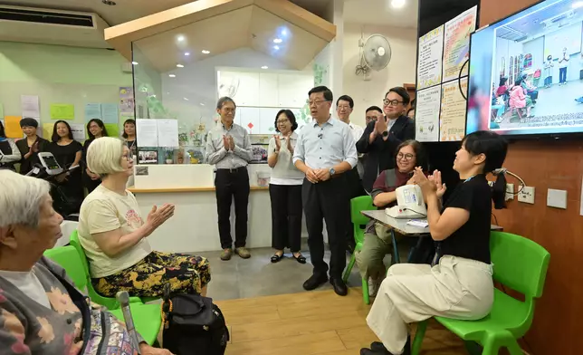 The Chief Executive, Mr John Lee, visited Sham Shui Po District today (August 26) to gather public views on Policy Address. Photo shows Mr Lee (fourth right), accompanied by the Secretary for Home and Youth Affairs, Miss Alice Mak (fourth left), visiting an elderly centre and interacting with the centre users. Source: HKSAR Government Press Releases