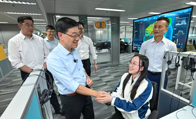 The Chief Executive, Mr John Lee, visited Sham Shui Po District today (August 26) to gather public views on Policy Address. Photo shows Mr Lee (front row, left), visiting the 1823 Contact Centre to learn how the centre applies AI technologies to expedite the handling of public enquiries, requests for assistance and complaints. Source: HKSAR Government Press Releases