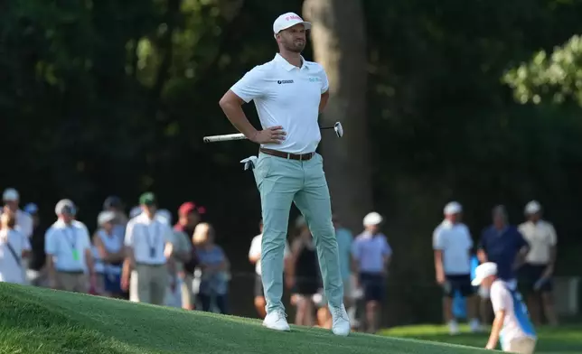 Wyndham Clark walks on the 14th fairway during the second round of the BMW Championship golf tournament, Friday, Aug. 21, 2026, in St. Louis. (AP Photo/Jeff Roberson)