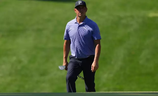 Gary Woodland walks to the 16th green during the second round of the BMW Championship golf tournament, Friday, Aug. 21, 2026, in St. Louis. (AP Photo/Jeff Roberson)