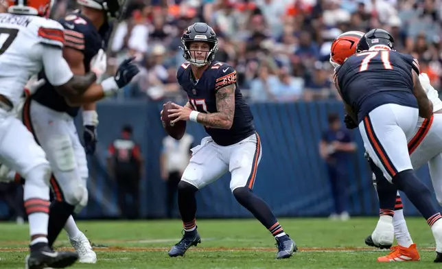 Chicago Bears quarterback Tyson Bagent (17) looks to pass during the first half of a preseason NFL football game, Saturday, Aug. 15, 2026, in Chicago. (AP Photo/Nam Y. Huh)