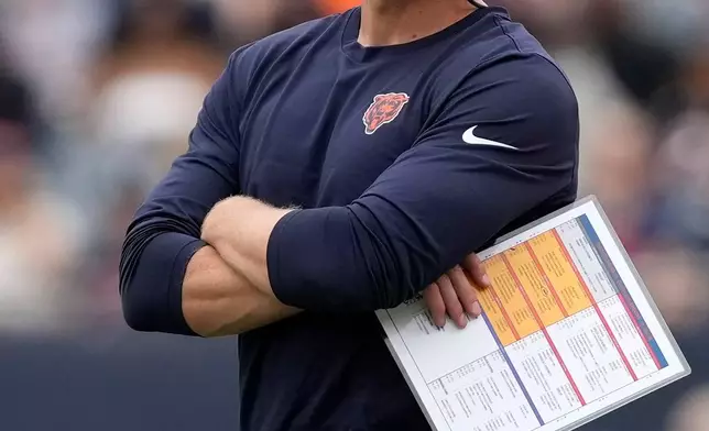 Chicago Bears head coach Ben Johnson looks on during the first half of a preseason NFL football game, Saturday, Aug. 15, 2026, in Chicago. (AP Photo/Nam Y. Huh)