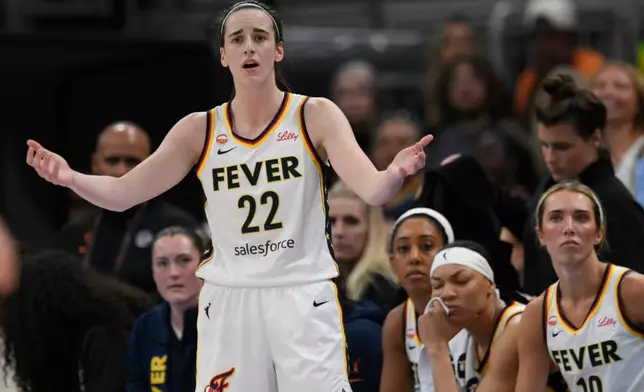Indiana Fever's Caitlin Clark reacts after being called for a foul during the second half of an WNBA basketball game against the Chicago Sky in Chicago, Saturday, Aug. 8, 2026. (AP Photo/Paul Beaty)