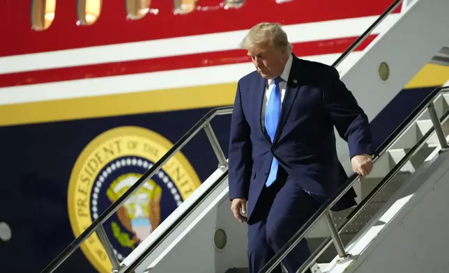 President Donald Trump arrives on Air Force One at Harry Reid International Airport in Las Vegas, Tuesday, Aug. 4, 2026. (AP Photo/Mark Schiefelbein)