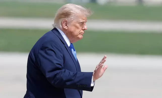 President Donald Trump waves as he walks from Marine One to Air Force One, at Joint Base Andrews, Md., Tuesday, Aug. 4, 2026. (AP Photo/Luis M. Alvarez)